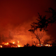 The Zogg burns a home along Platina Road in Igo, California on Sept. 27.